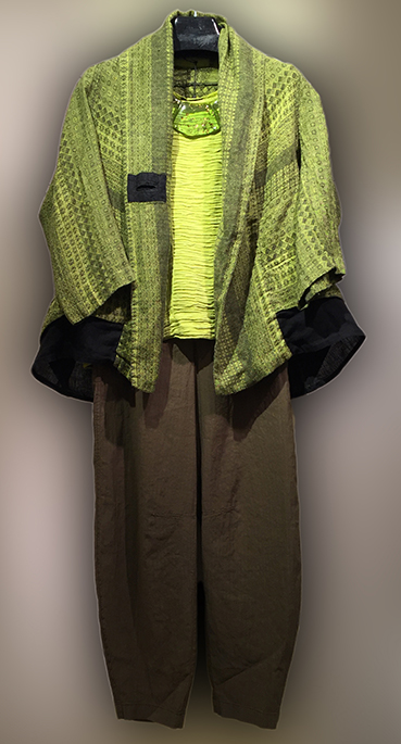  Griza linen jacket over silk blend top. Oska pants 