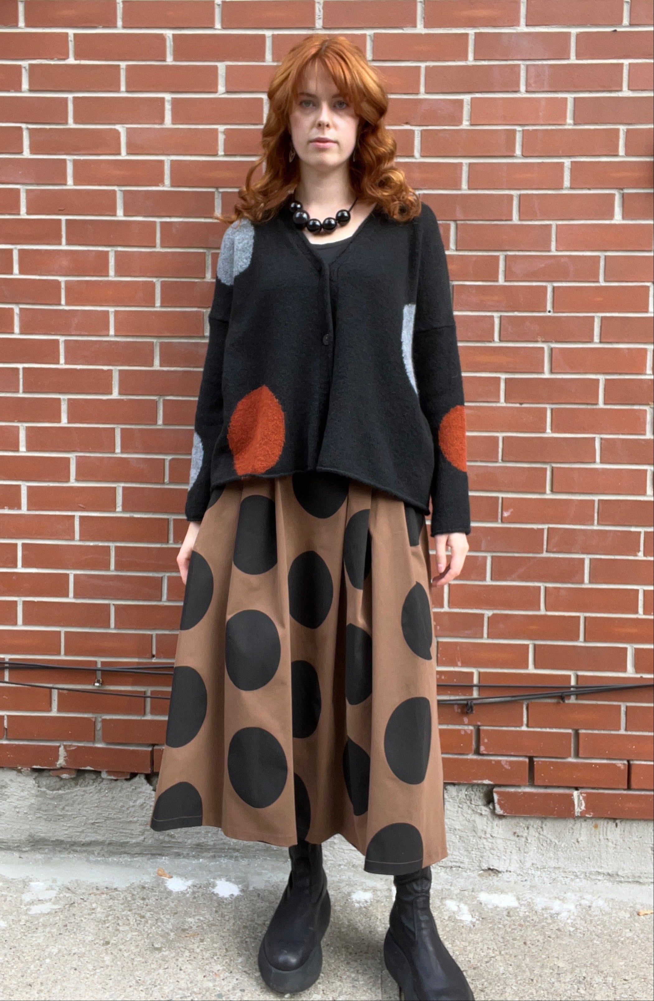 NEIRAMI Circle Print Two-Button Cardigan in Black