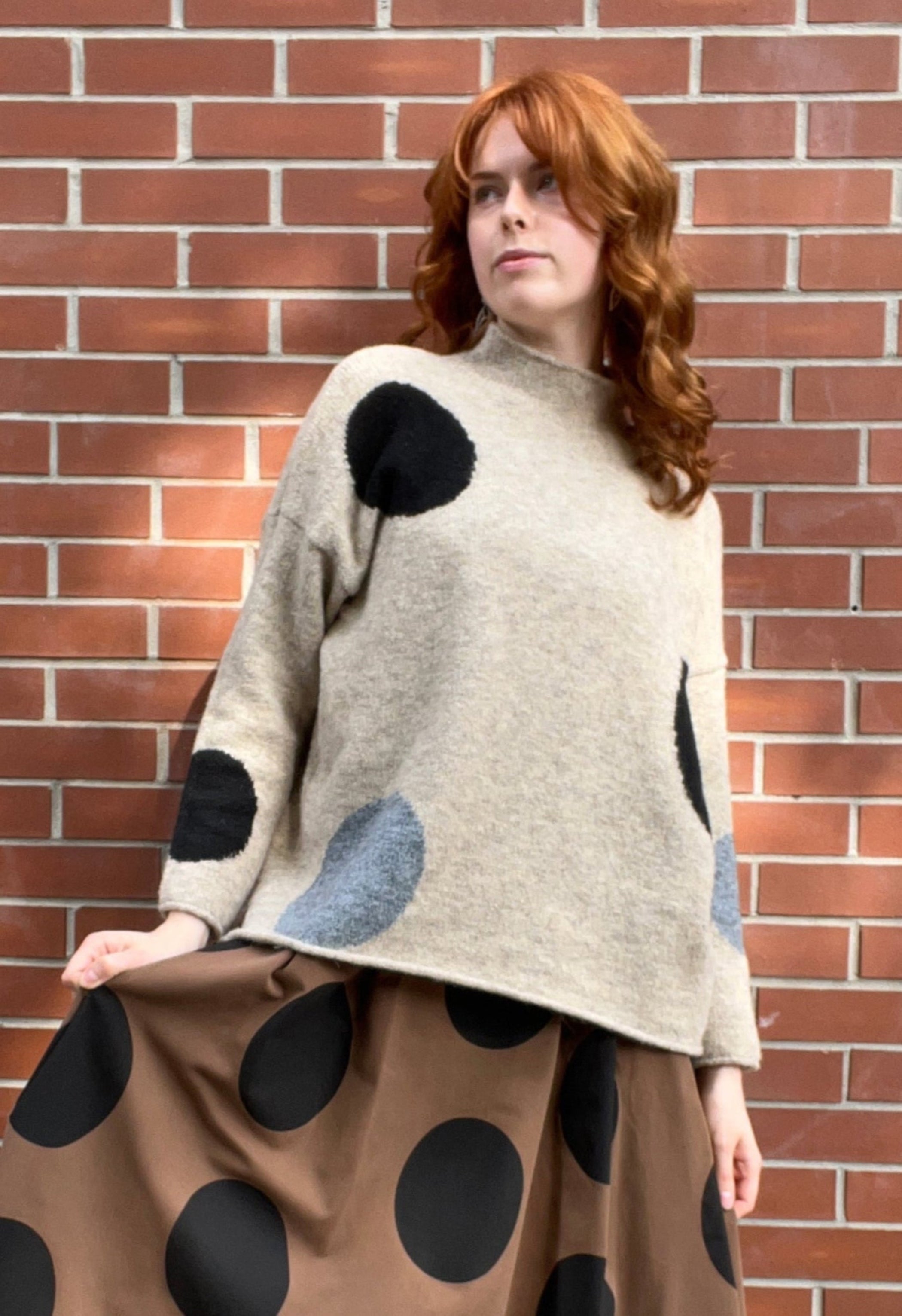 NEIRAMI Circle Print Chimney Neck Sweater in Beige and Grey