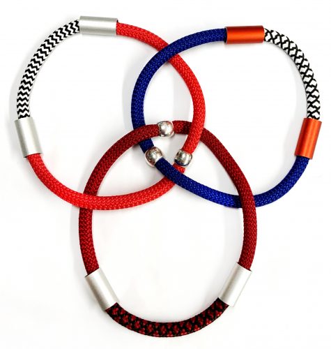 Cord collars with aluminum beads.