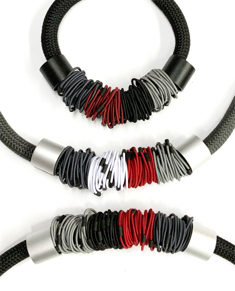 Thick cord collars wrapped in elastic, with aluminum beads.