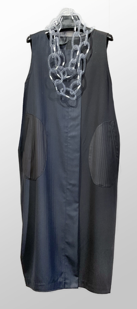 Moyuru sleeveless dress in mixed suiting patterns.