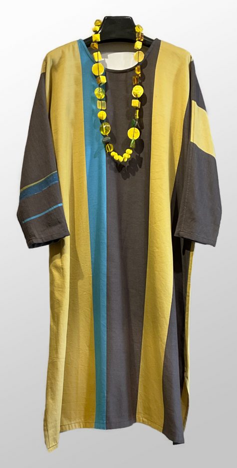 Tamaki Niime 100% cotton caftan dress, paired with a yellow Sobral necklace.